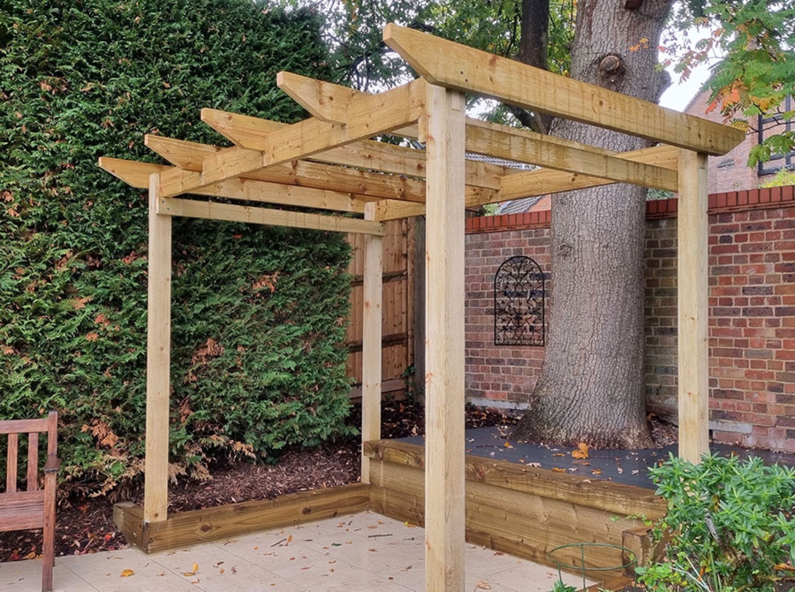 Hampshire garden transformation by Bay Landscape Design — paving, planting and lawn