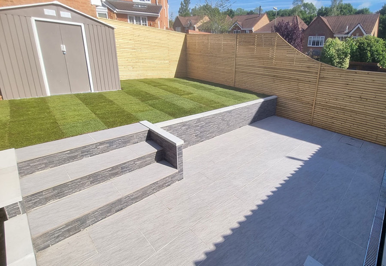 Bay Landscape Design build in progress — patio and edging works