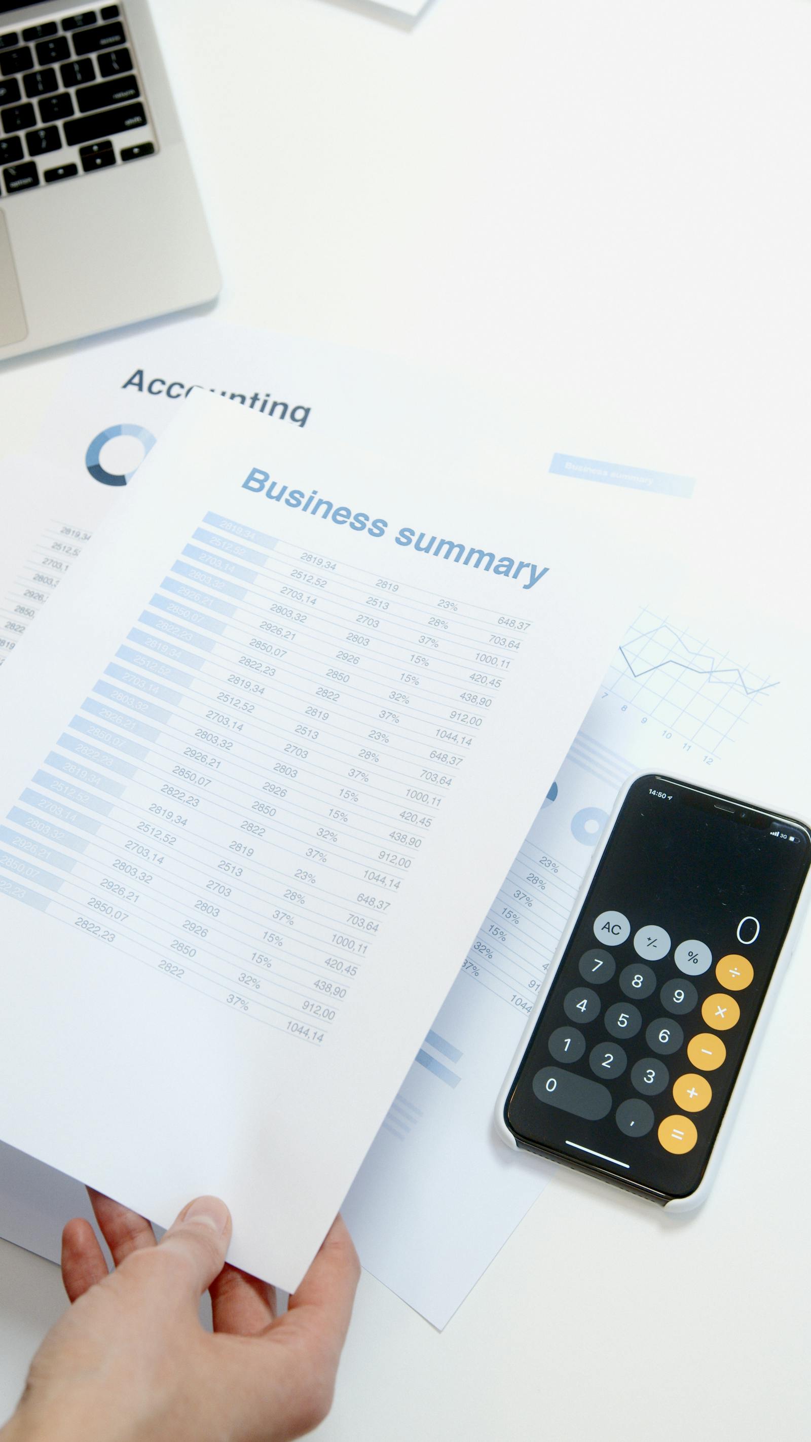 Accountant's desk with financial analysis materials