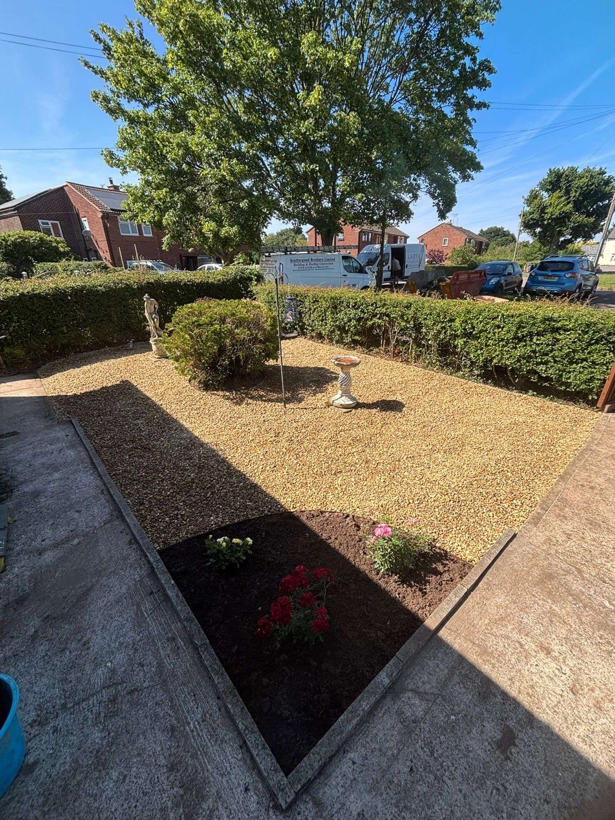 Front garden low-maintenance golden gravel transformation by Lazy Days