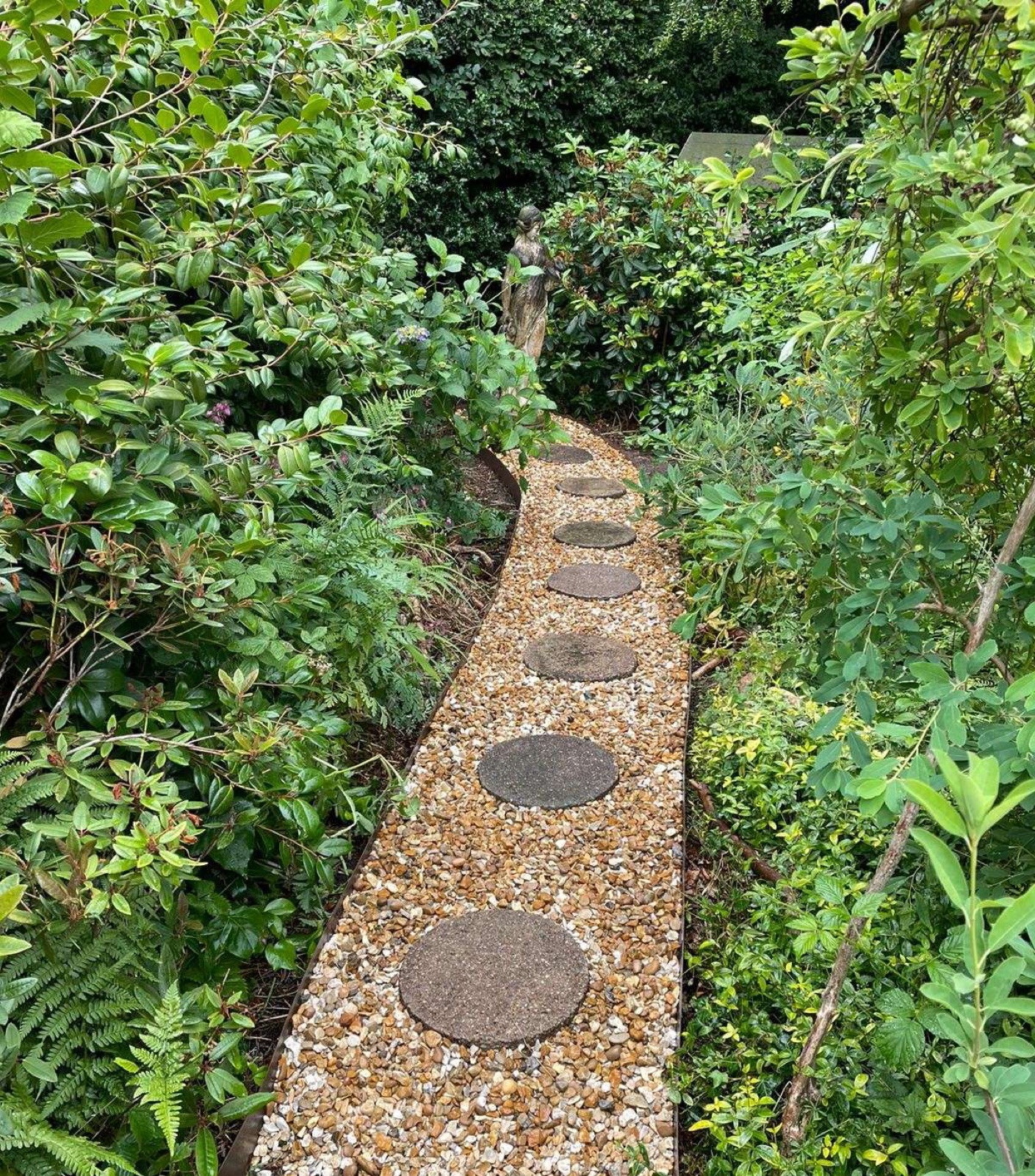 Woodland path with timber sleeper steps and compost bin construction by Lazy Days