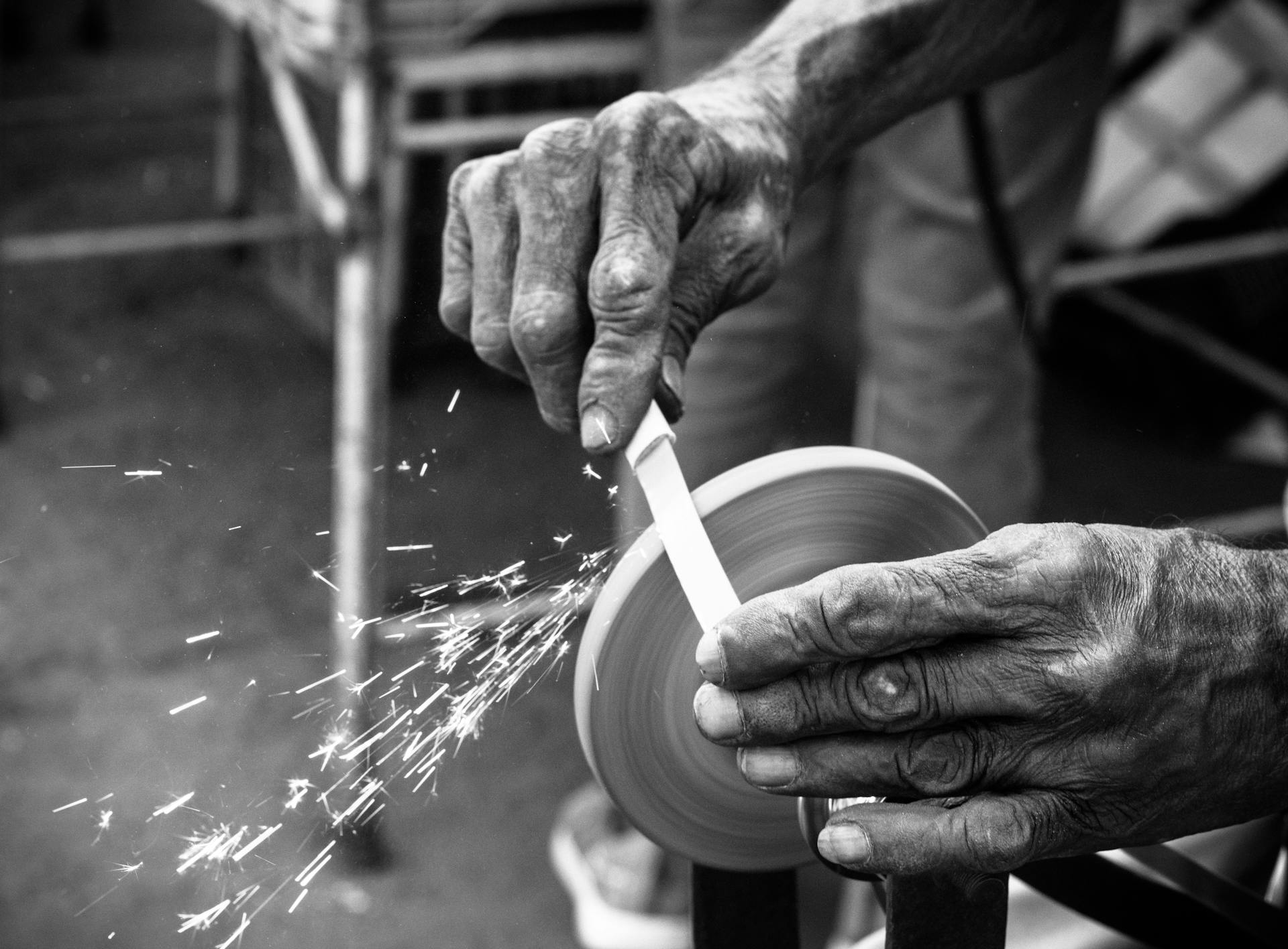 Senior craftsman working at the wheel